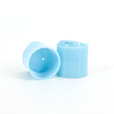 中国 28/410 28mm Plastic Light Blue Disc Top Cap For Lotion Toner Serum Liquid Soap 販売のため