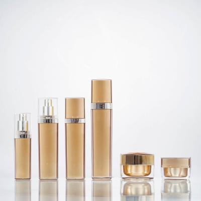 China Acrylic Luxury Cosmetic Packaging Lotion Bottle Jars Plastic Container Set Empty for sale