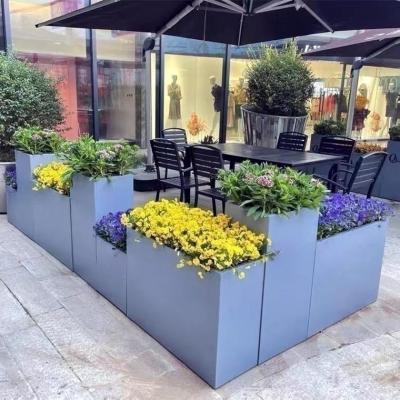 China Custom Color High Durability Home Decoration Material Stainless Steel Flowerpot for sale