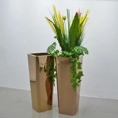 China Smooth Stainless Steel Flowerpot Surface Unlock Garden Decoration for sale
