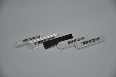 China o código de barras EAS do Dr. AM da tira 58kHz etiqueta a etiqueta macia da segurança, largura do ± 0.2mm de 10.8mm à venda