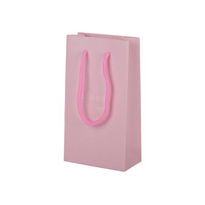 China 210gsm Coated Paper Gift Packing Paper Bags Pink Color Multipurpose OEM for sale
