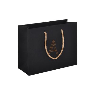China Hot Foil Stamping Custom Black Paper Bags With Handles 30x20x10cm for sale