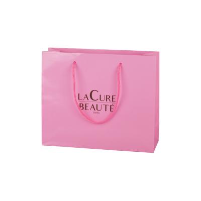 China Glossy Lamination Coated Paper Bags Packaging Cosmetic With Handle for sale