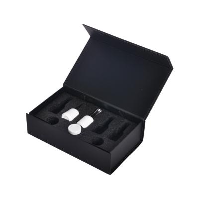 China Recyclable Black Magnetic Gift Box Nail Polish Set Packaging With Foam Insert for sale