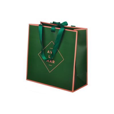 China Recyclable Green Gift Paper Bags Packaging Clothing With Ribbon Handle for sale
