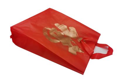 中国 中国の赤いHDPE/LLDPEのプラスチック ブティックは柔らかいループ ハンドルによって袋に入れる 販売のため