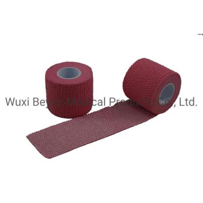 China Stretchy Bandage Tape Self Adhesive Elastic Tape Pink Hand Tear Durable Adhesive for sale