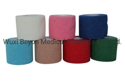 China Latex Free Cotton Cohesive Bandage Light Navy Blue Grey Cohesive Tape Elastic Flexible for sale