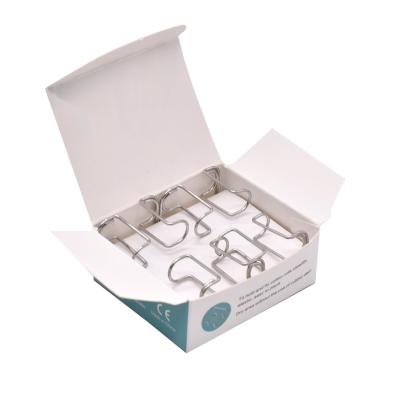 China SJ Best Quality Disposable Stainless Steel Dental Cotton Roll Holder Clip 4pcs/box OEM Wholesale en venta