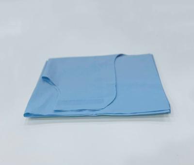 中国 SJ Hospital Sleeveless Disposable Exam Paper Gown for Patients OEM Wholesale 販売のため