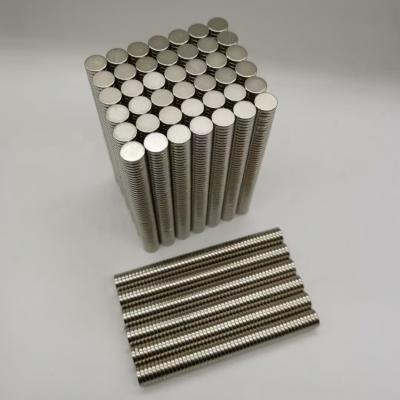 China Small Disc Round Industrial Neodymium Magnets N33 N35 Grade 10x1 mm For Jewerly Box for sale