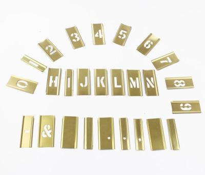 China Golden 92pcs Brass Interlocking Stencils Kit Advertise Printing for sale