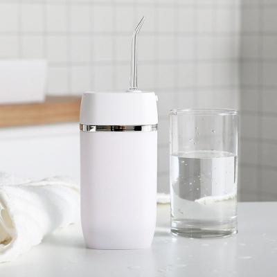 China ABS Electric Tooth Mini Water Flosser Ultralight 165ml Lithium battery operated for sale