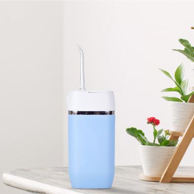 China OEM Portable Mini Water Flosser Automatic 165ml For Teeth Cleaning for sale