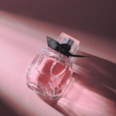 China Custom 50ml Pump Spray Perfume Bottle Clear Empty Square Glass Refillable for sale