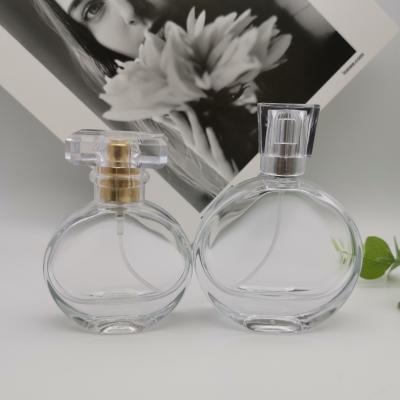 China Flat Shoulder Cylinder Perfume Dispenser Bottles 50ml 100ml for sale