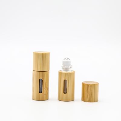 China 1ml 2ml Mini Perfume Aromatherapy Glass Roll On Bottles Wooden Shell for sale