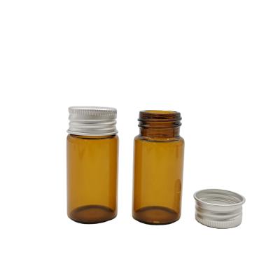China 1ml 2ml Empty Amber Perfume Mini Glass Vials With Screw Top for sale