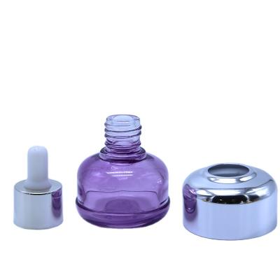 China 20ml 30ml 50ml Aromatherapy Glass Dropper Vial Bottles With UV Plating Cap for sale