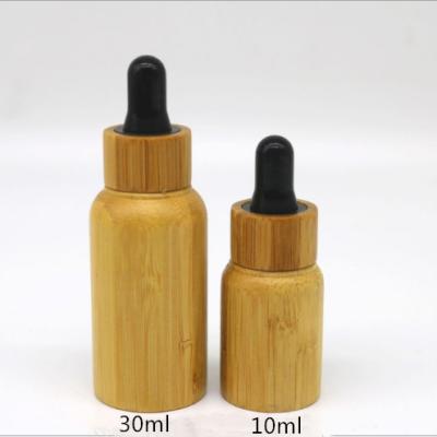 China Botella de aceite esencial de bambú de Hanya Boston Dropper Bottles 30ml 50ml 100ml en venta