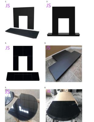 China best black granite fireplace hearth and panel for sale