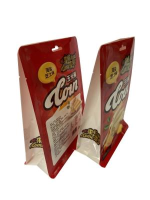 China Custom Heat Seal Flat Bottom Pouches Glossy Surface For Corn Snack Food for sale