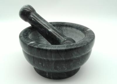 Chine Mortier en pierre noir de mortier et de pilon, de marbre et forme ronde réglée de pilon à vendre