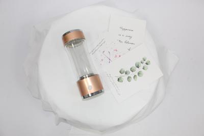 China Vidrio de tubo recto del doble de la botella 5V 2A del generador del agua del hidrógeno del Spe Rich Beauty Health Cup en venta