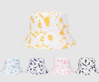 China Printed Tie Dye Graffiti Sunscreen Double-Sided Wear Bucket Hat for women and men for sale