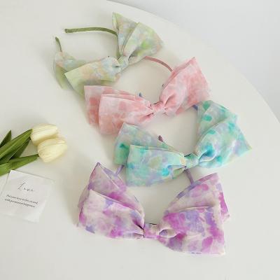 China Symphony Versatile Printed Fabric Headband With Bow for women en venta