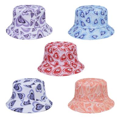 China Summer Heart Print Double-Sided Sunscreen Fisherman Hat For Women for sale