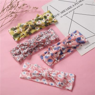 China Floral Stretch Knitted Cotton Bow Headband For Baby Boneless Super Soft Knotted Headwrap for sale