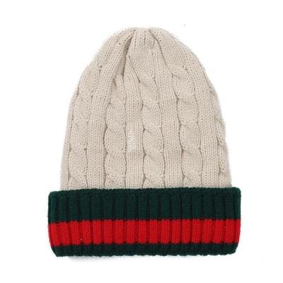 China Hot Selling Fashion Knitted Beanie Manufacturer Winter Hat Woman Twist and Plush Beanie Hat with Pom for sale