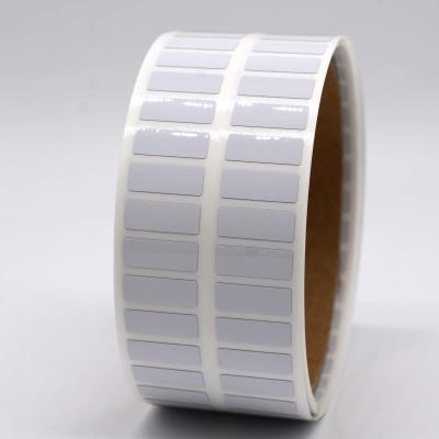 China Etiquetas de baja temperatura de 16 mm x 6 mm 1.5 milímetros Etiqueta de poliamida blanca brillante resistente a altas temperaturas en venta