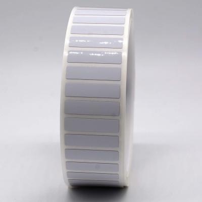 Chine Étiquettes adhésives à haute température de 25 mm x 6 mm, étiquette polyimide blanche brillante de 1,5 millimètre à vendre