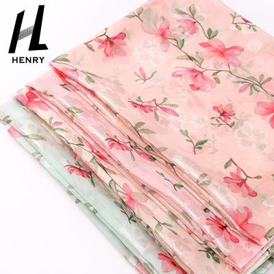 China Small Fresh Style Soft Tulle Fabric Light Texture Woven Chiffon Polyesters Floral For Dress for sale